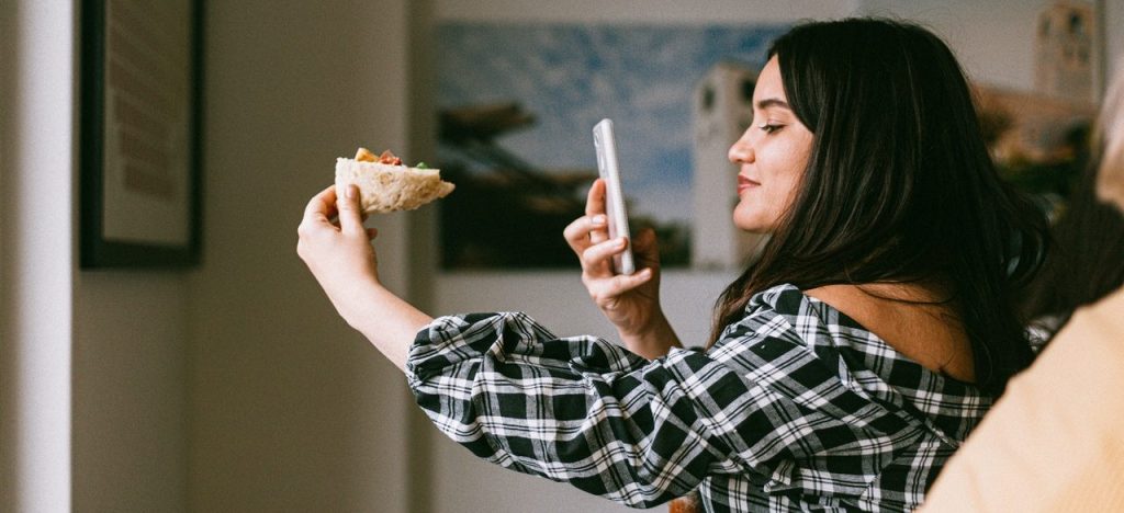 Image of woman taking a photo