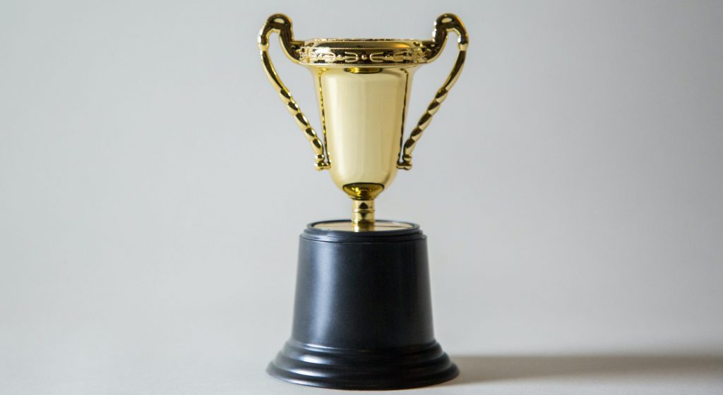 yellow and white trophy