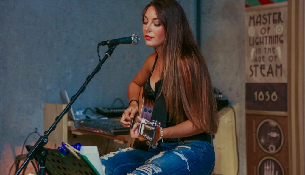 Woman with acoustic guitar