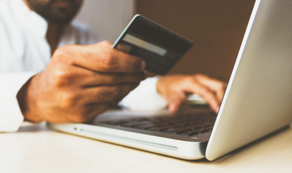 Stock photo of the Business Man with a credit card by rupixen