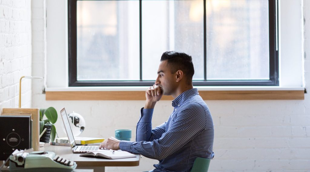 Frustrated man on computerr