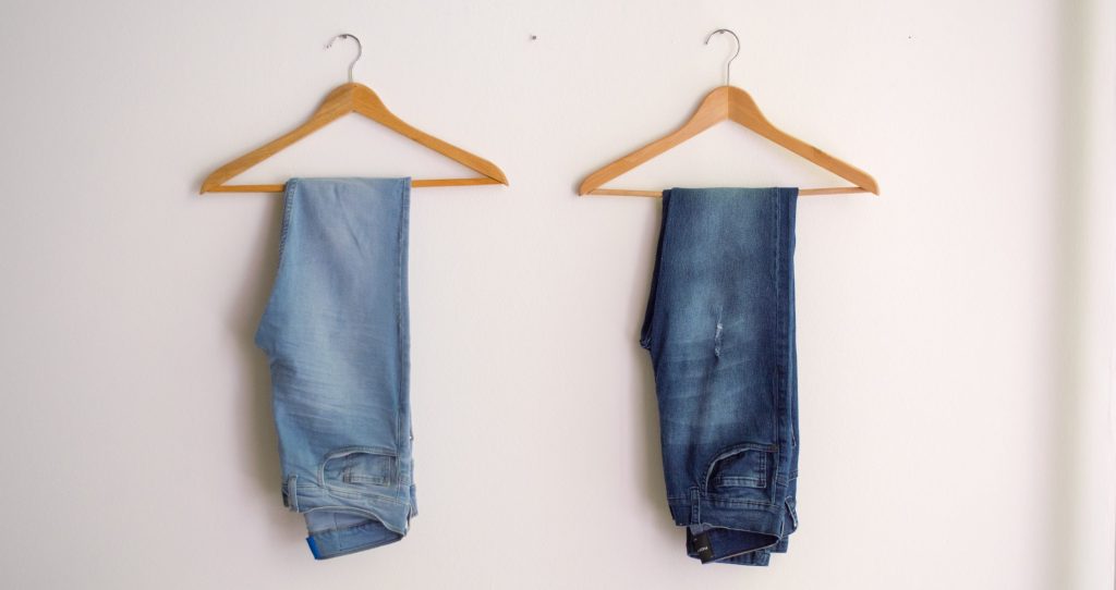 Two hanged blue stonewash and blue jeans