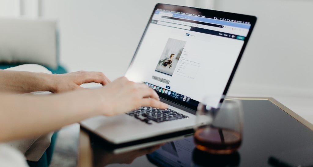 Person using macbook laptop